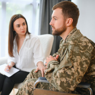 Woman reassuring a man