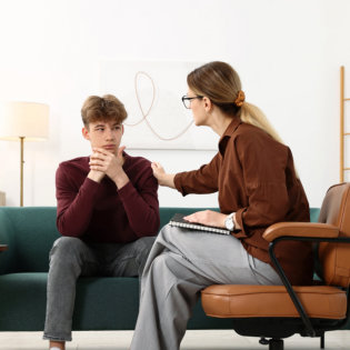Woman talking to a man