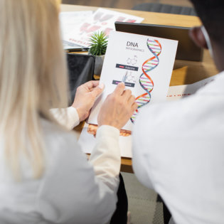 Woman looking at DNA test