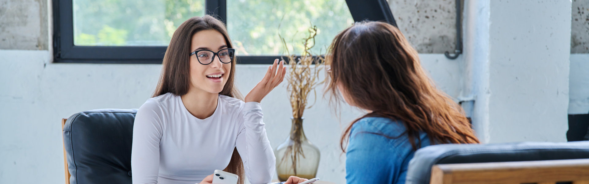 Two women talking