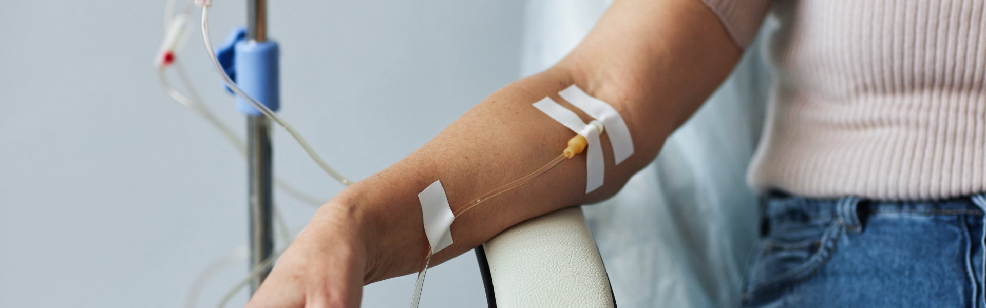 Close-up shot of blood being drawn from a forearm
