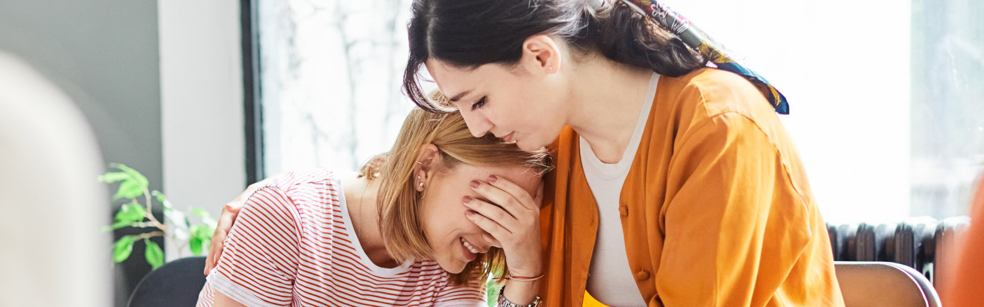 Woman reassuring a patient