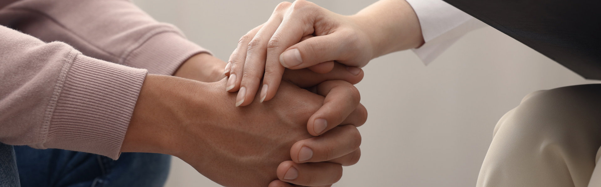 Close up shot of a woman comforting a man