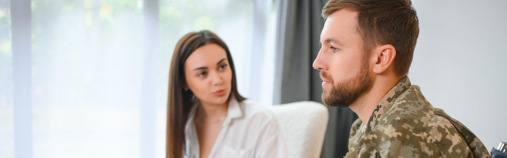 Woman reassuring a man